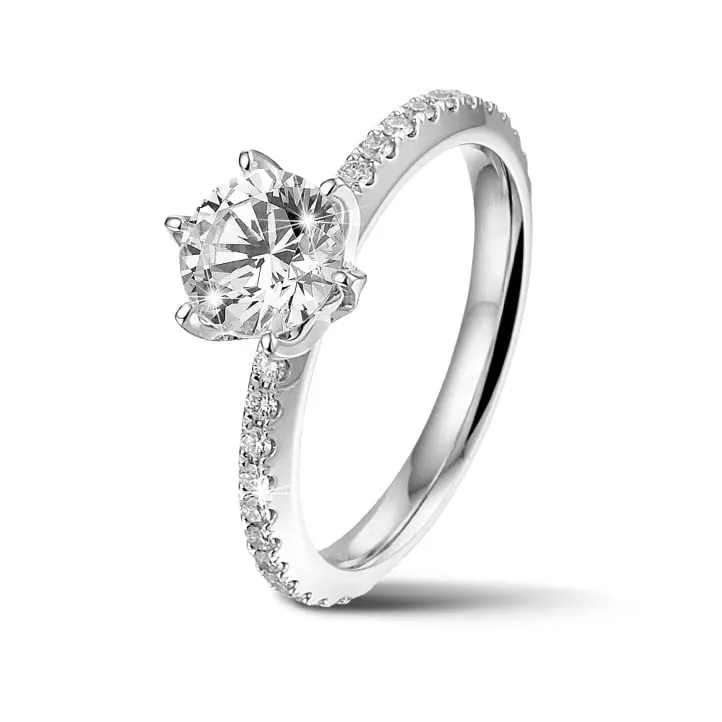 0.90 quilates anillo solitario en oro blanco con diamantes en los lados 