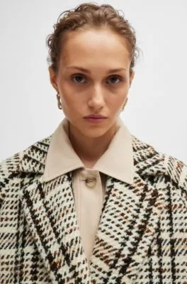 Abrigo oversize fit en tejido con lana a cuadros