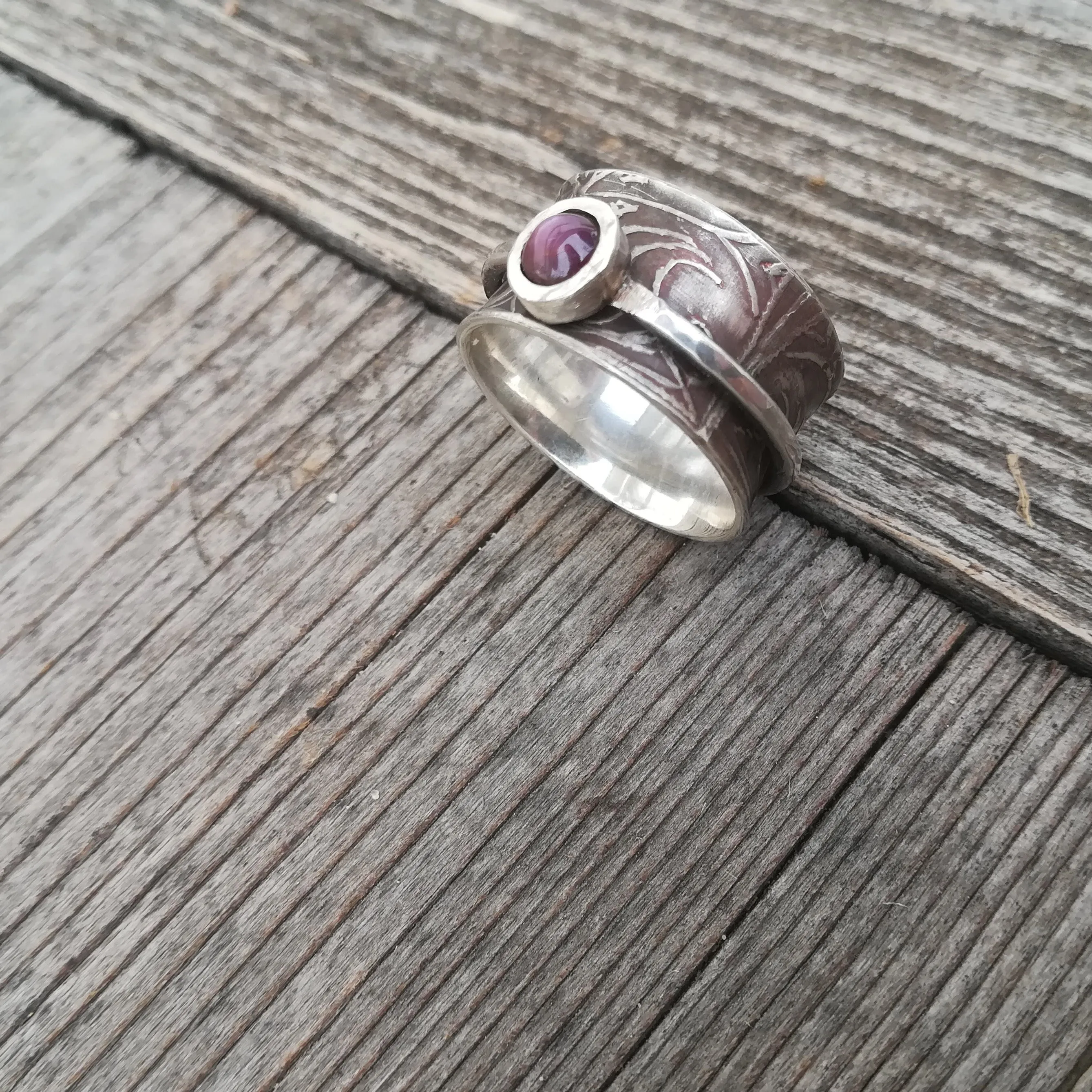 ANILLO GIRATORIO RUBí ESTRELLA Y PLATA DE LEY  TALLA 19