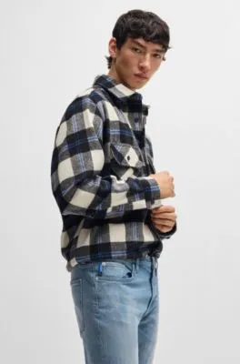 Jeans extra slim fit de denim elástico azul medio