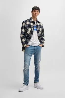 Jeans extra slim fit de denim elástico azul medio