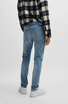 Jeans extra slim fit de denim elástico azul medio