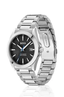 Reloj plateado con esfera negra ranurada