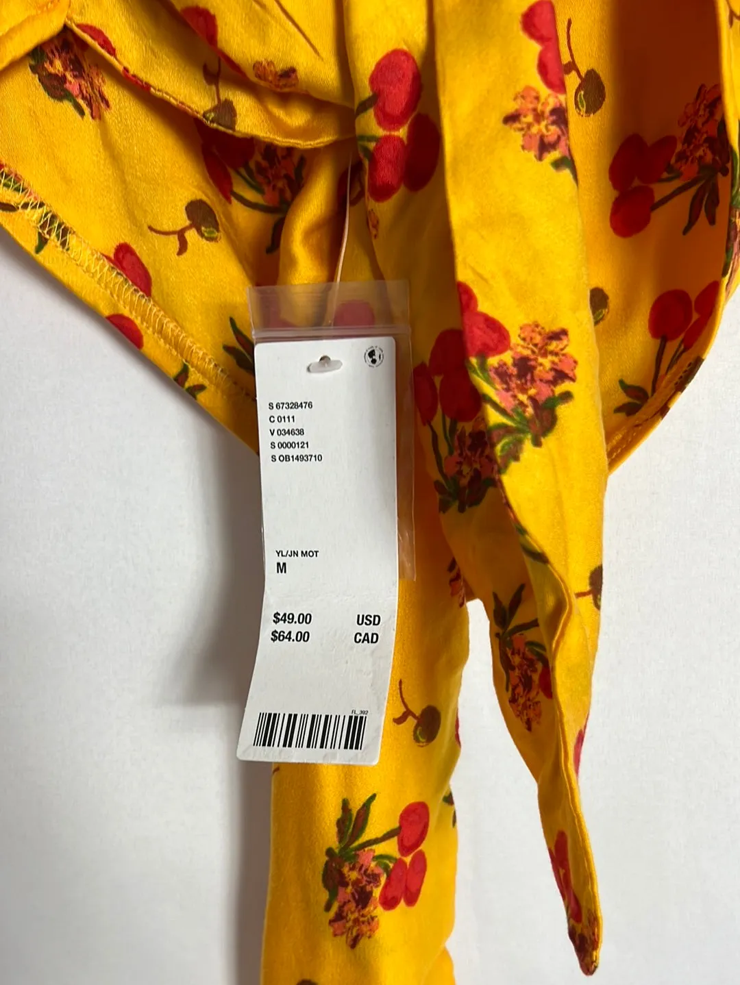 URBAN OUTFITTERS. Crop top mostaza estampado fruta. T M